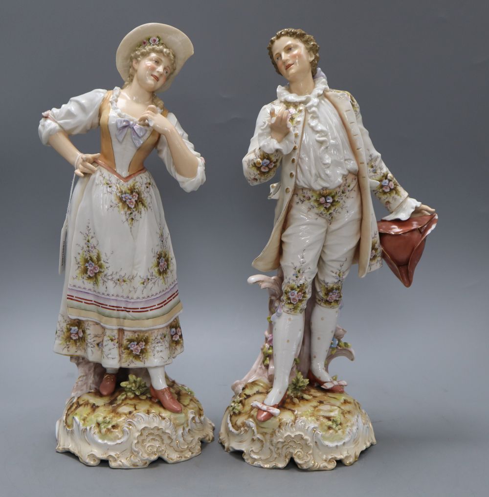 A pair of Rudolstadt Volkstedt figures of a lady and gentleman, height 40cm